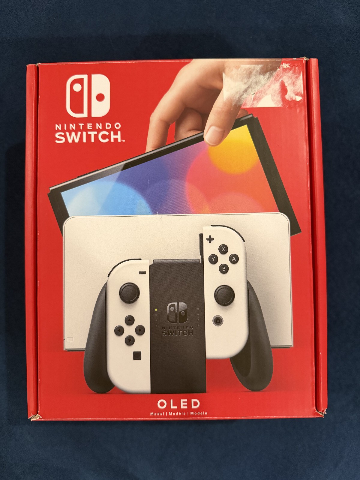 Nintendo Switch Oled Edition (Comes w/ charging stand, carrying case and Game)