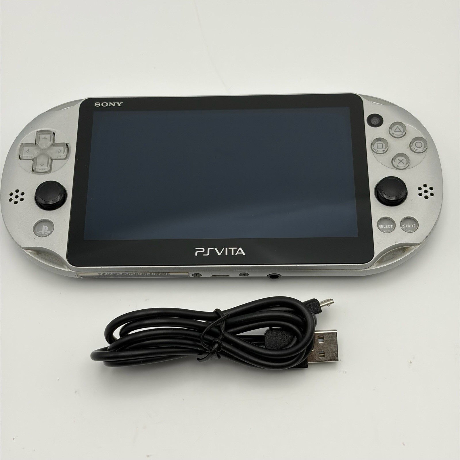 SONY PS Vita PCH-2000 Console Silver Very Good Fast Shipping No joystick drift.