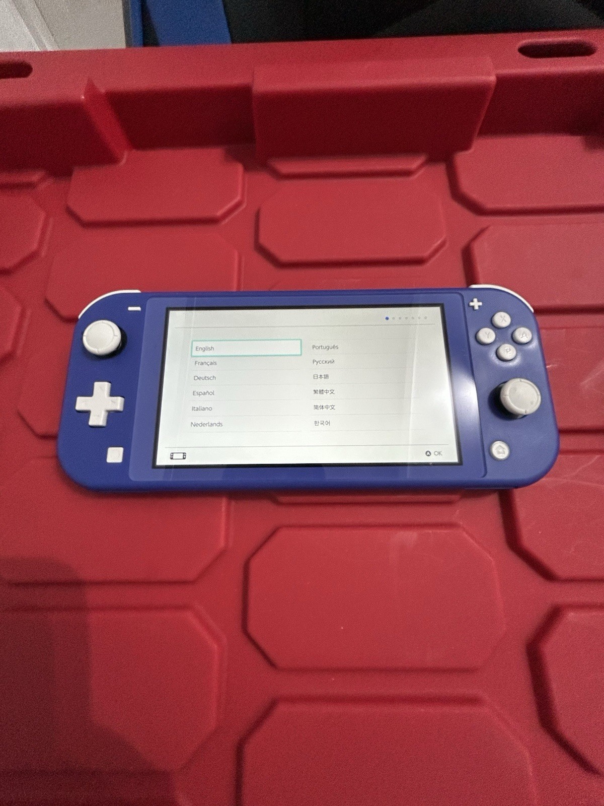 Nintendo Switch Lite (Blue) + Grip Case + Mario Kart 8 Deluxe Game