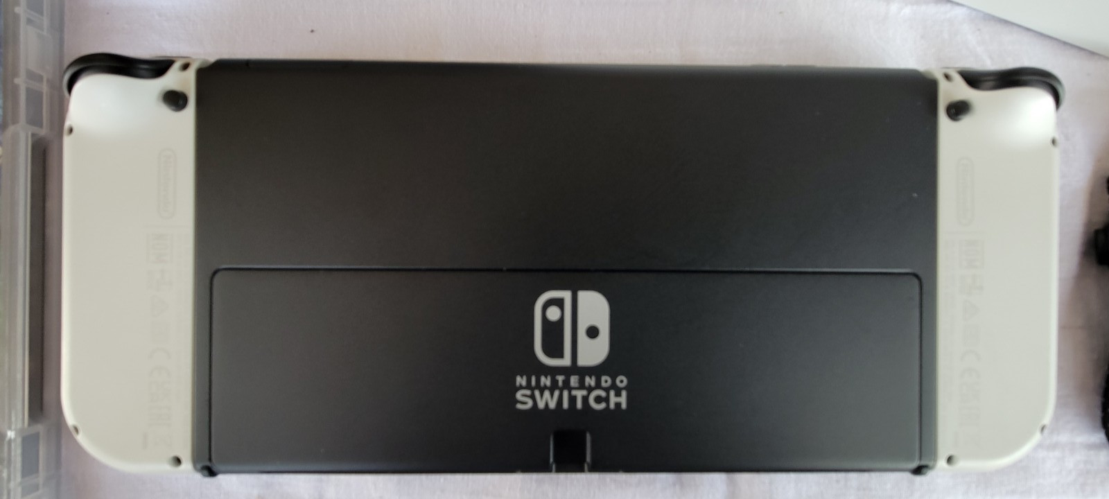 Nintendo Switch OLED 64GB – Complete Bundle with Super Smash Bros. Ultimate