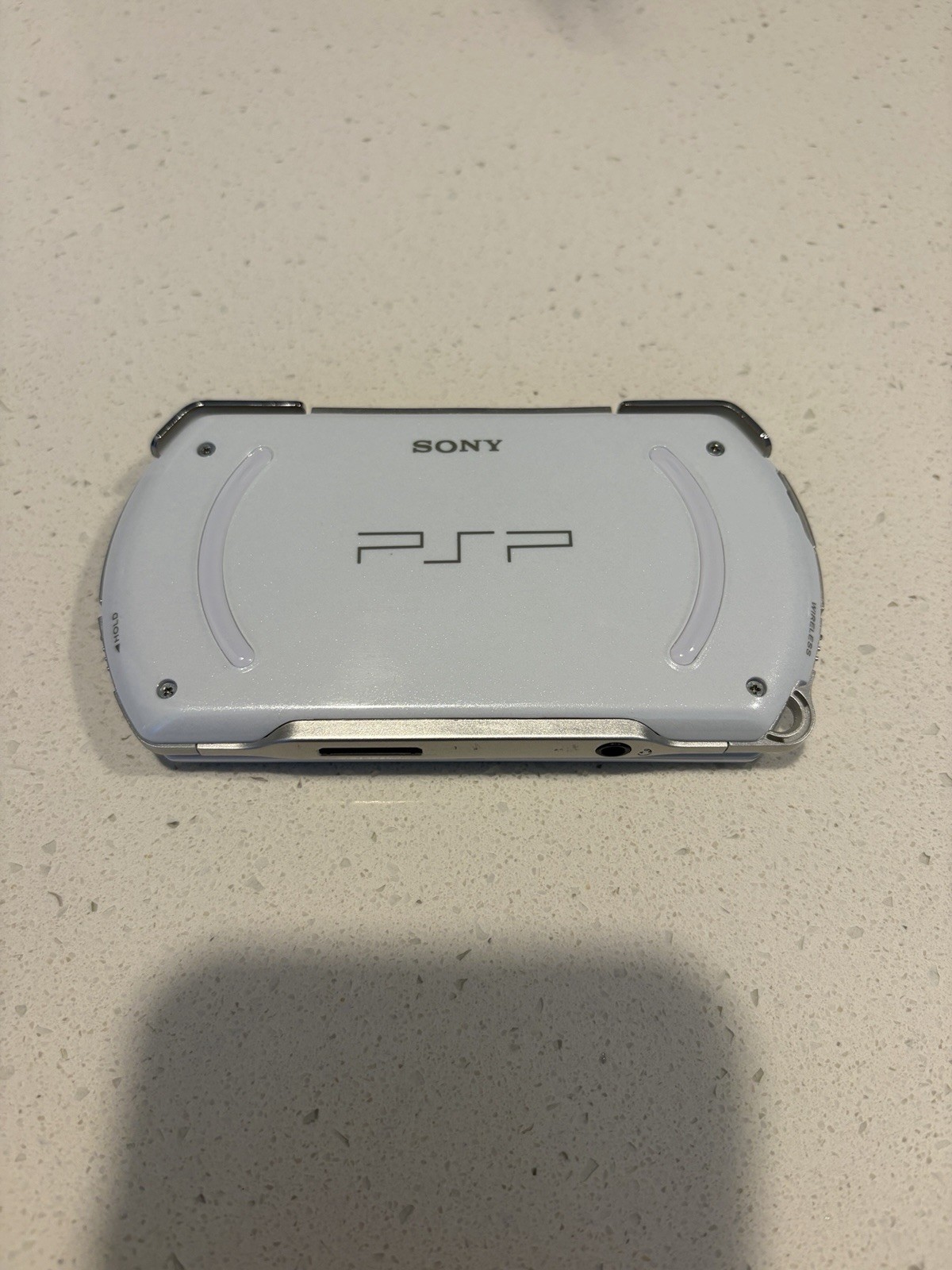 Sony PSP Go White/Silver 16GB Wi-Fi Region Free Handheld w/ AC Adapter