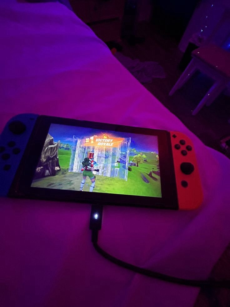 Nintendo Switch Console w/ Blue & Red Joy-Con, 32GB 720p HD Handheld