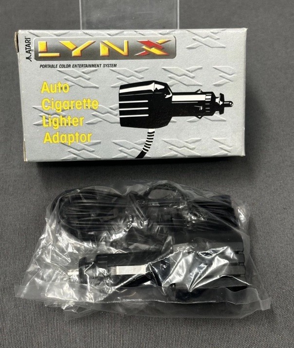 Atari Lynx Cigarette Lighter Adaptor Model PAG 3300 Vintage New Opened Box