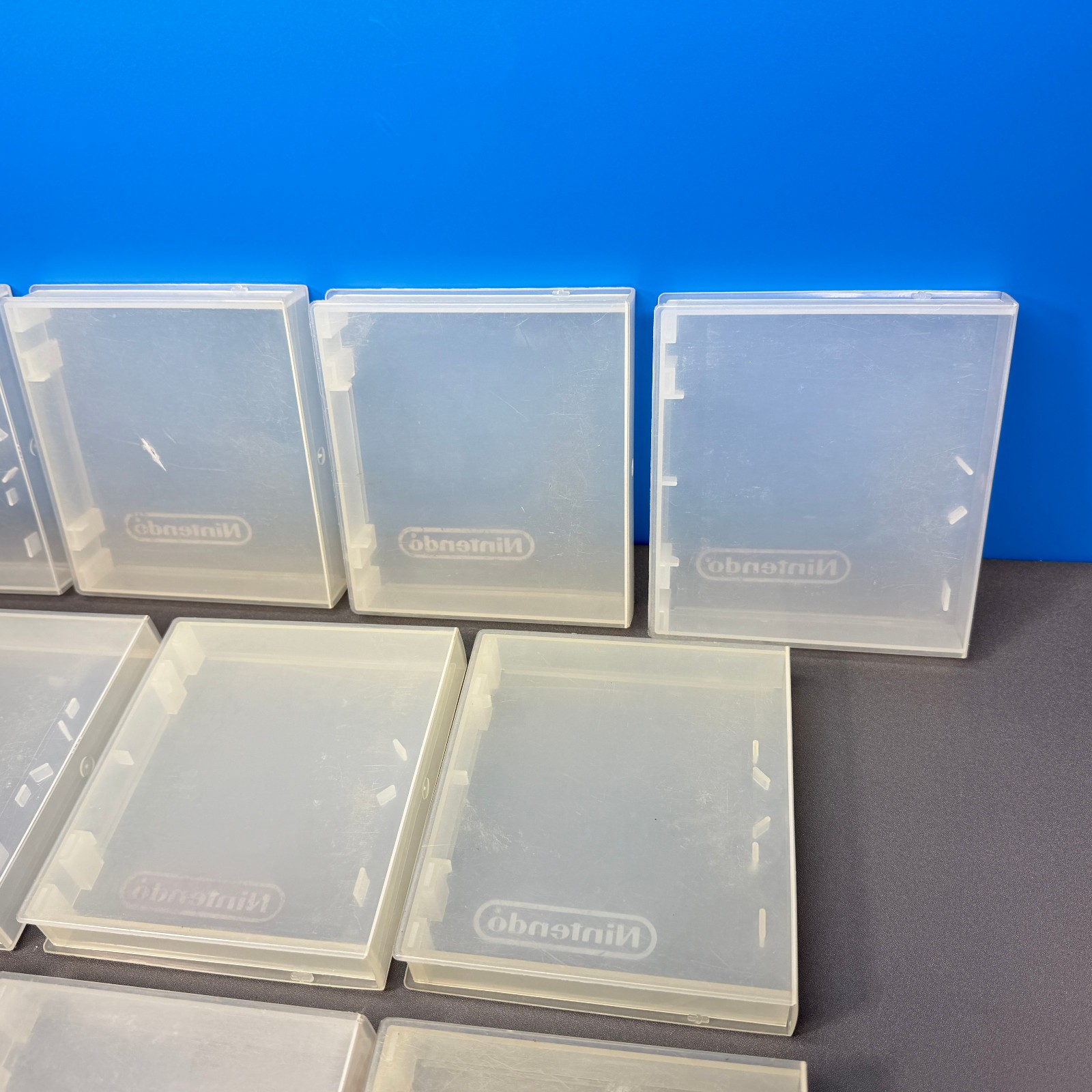 LOT OF 10 NINTENDO NES GAME HARD PLASTIC CLAMSHELL CASE CASES CLEAR RED LOGO OEM