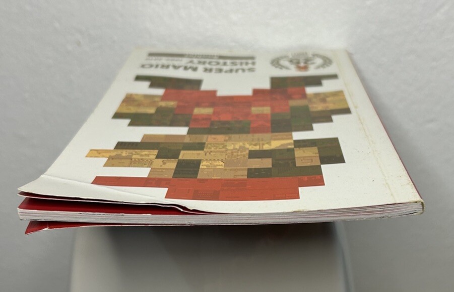Super Mario History 1985-2010 25th Anniversary Booklet Pre Owned FAST SHIPPING