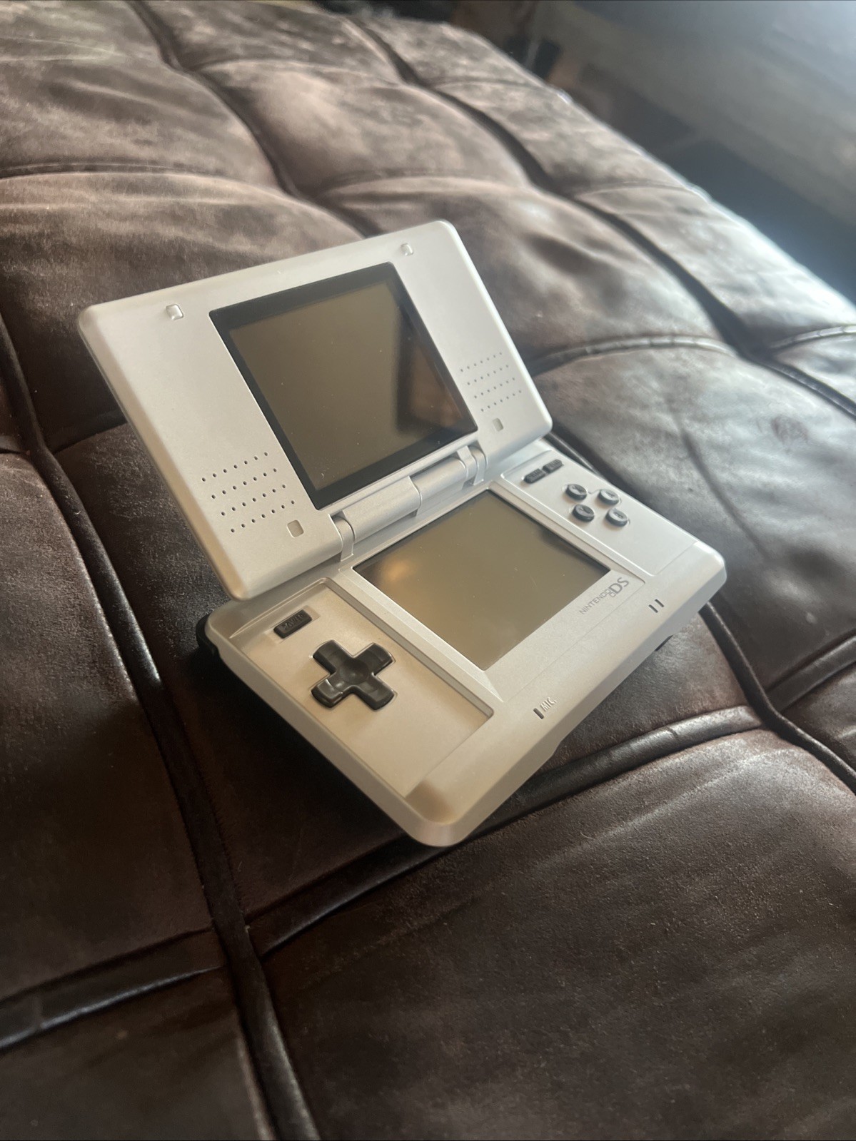 Titanium silver Original Nintendo DS with charger and stylus