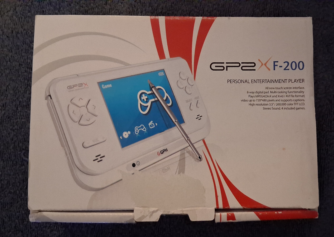 GP2X F-200 Portable Retro Linux Console + TV Output Cradle, working tested