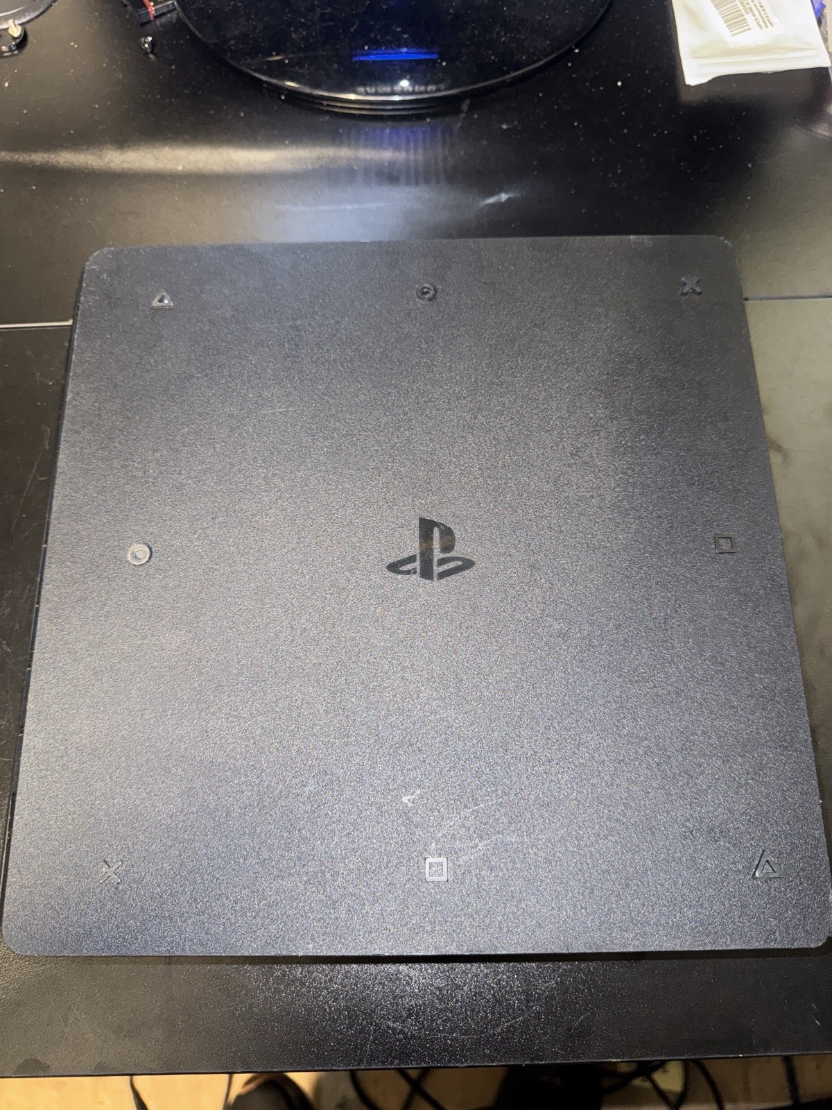 Sony PlayStation 4 Slim 1TB Console – Jet Black Console Only. Tested And Works