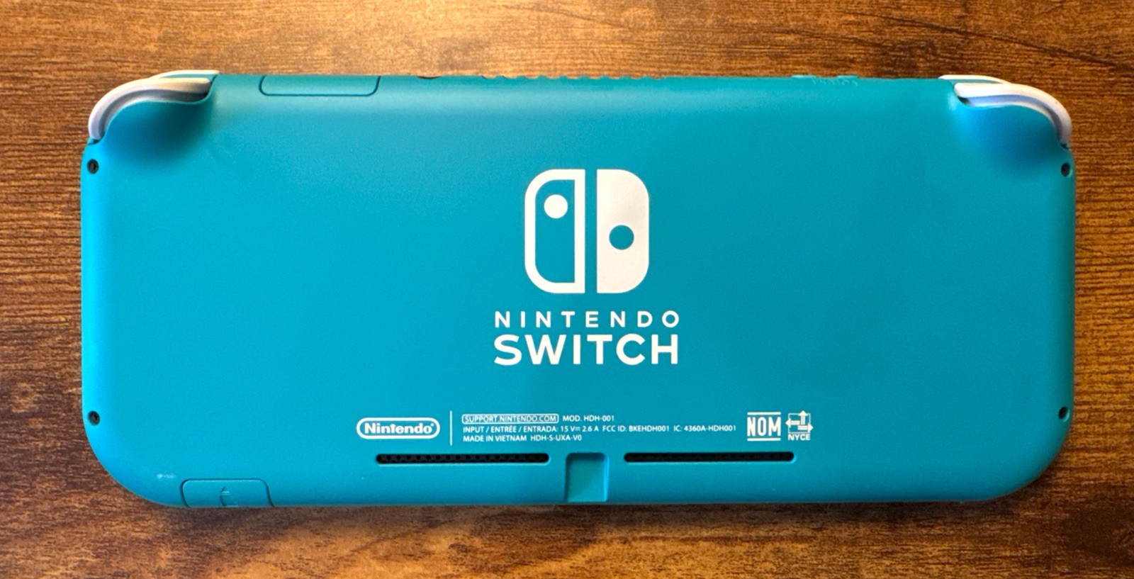 Nintendo Switch Lite Turquoise Teal 32GB Handheld Console Bundle W Charging Cord