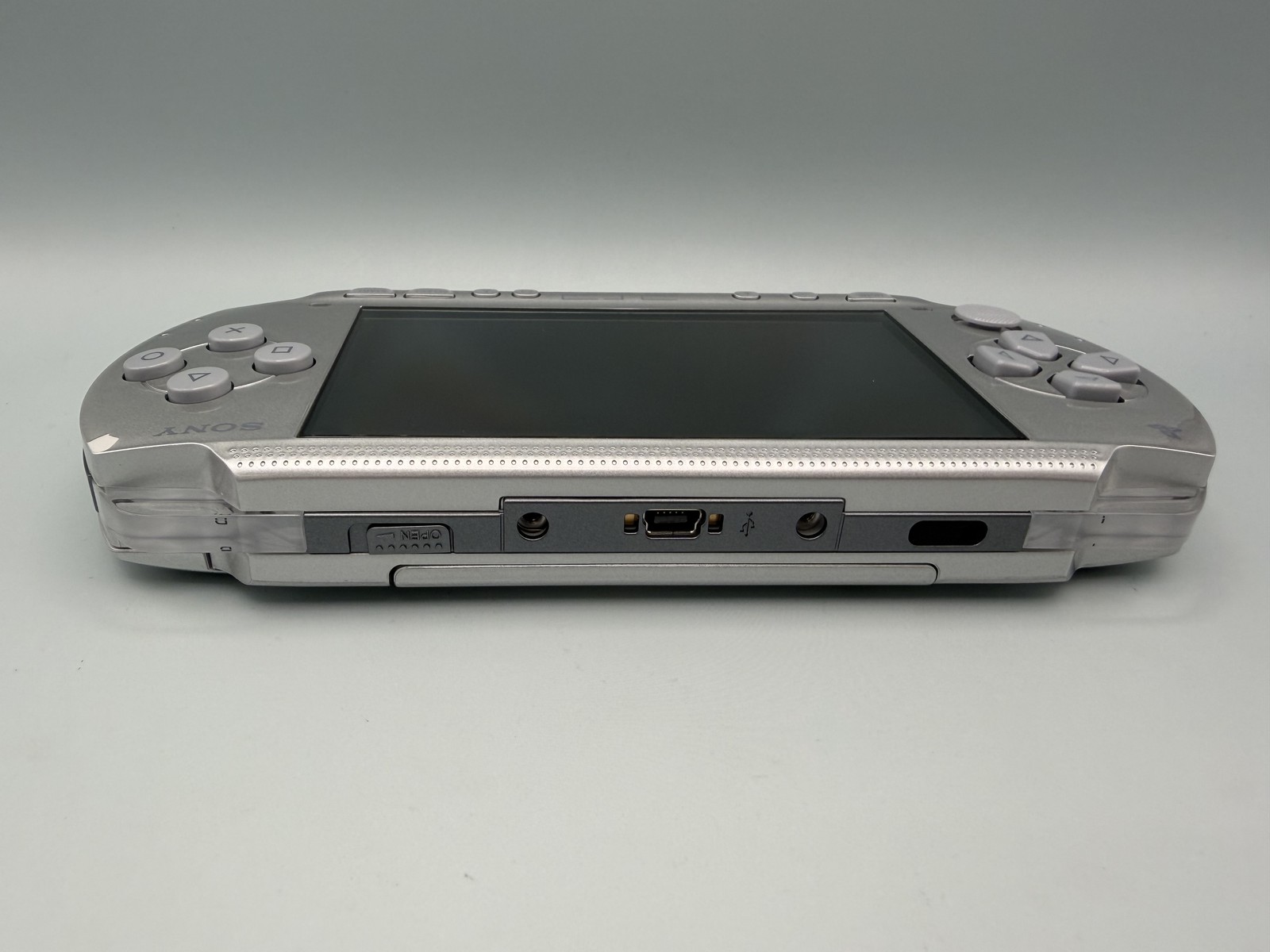 Sony PSP 1000 Silver Handheld Console – Tested Working + New Battery & Charger