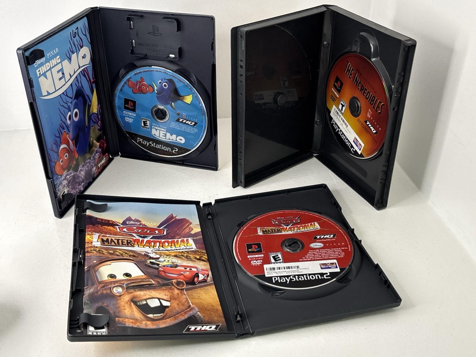 Disney PlayStation 2 Game Lot Finding Nemo, Cars Mater National, The Incredibles