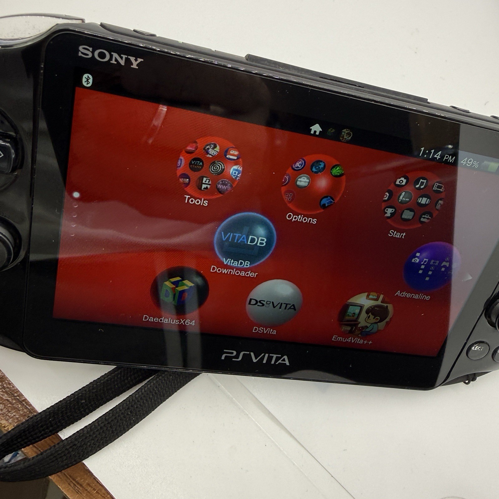 Sony PS Vita PCH-2000 Black Handheld Console + Charger + 64GB SD Card