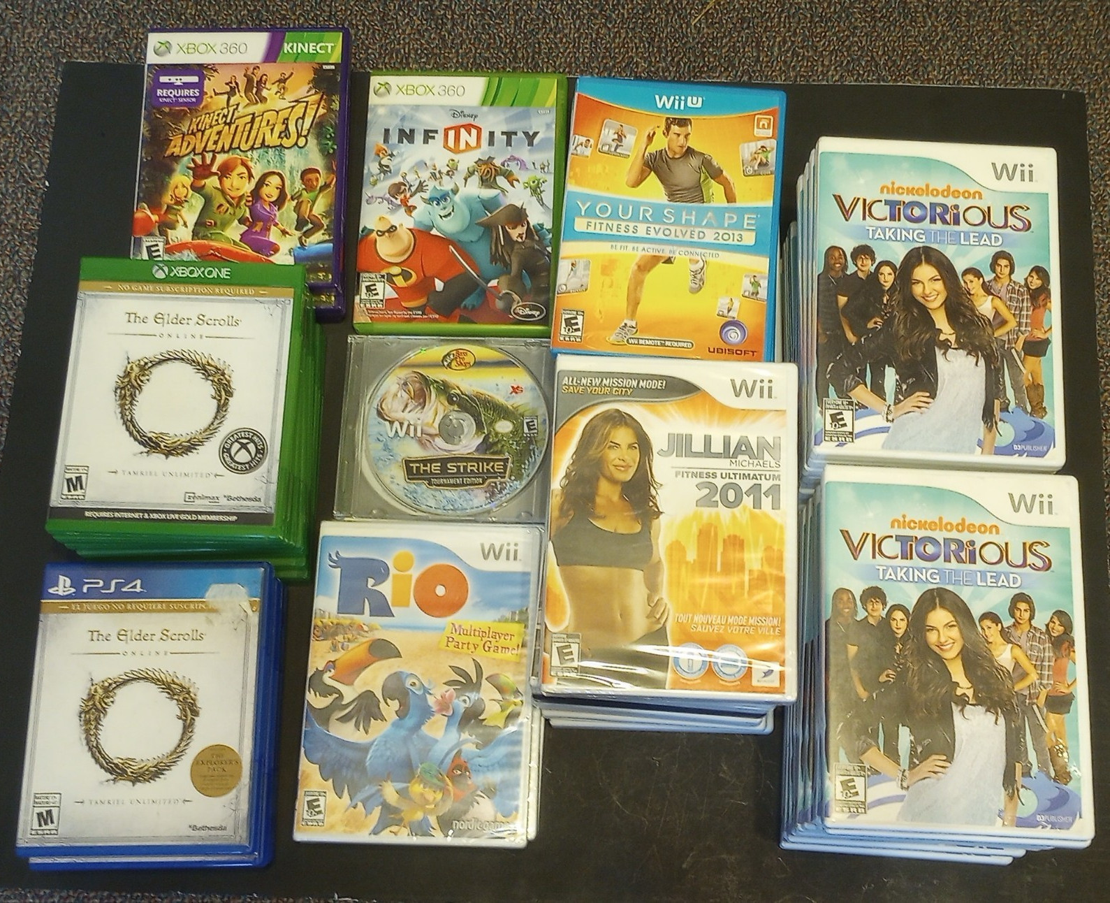 Nintendo/Microsoft Mixed Video Game Lot Wii/Wii U/PS4/Xbox 360 Kinect 57 Games.