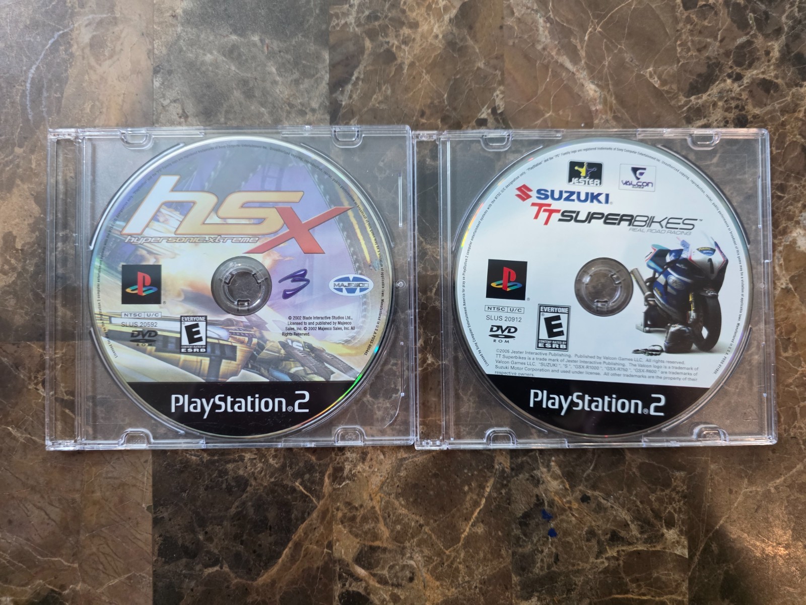 PS2 Slim Console + 13 games+Guncon+ SF Controller + Xmen vs Street Fighter etc.