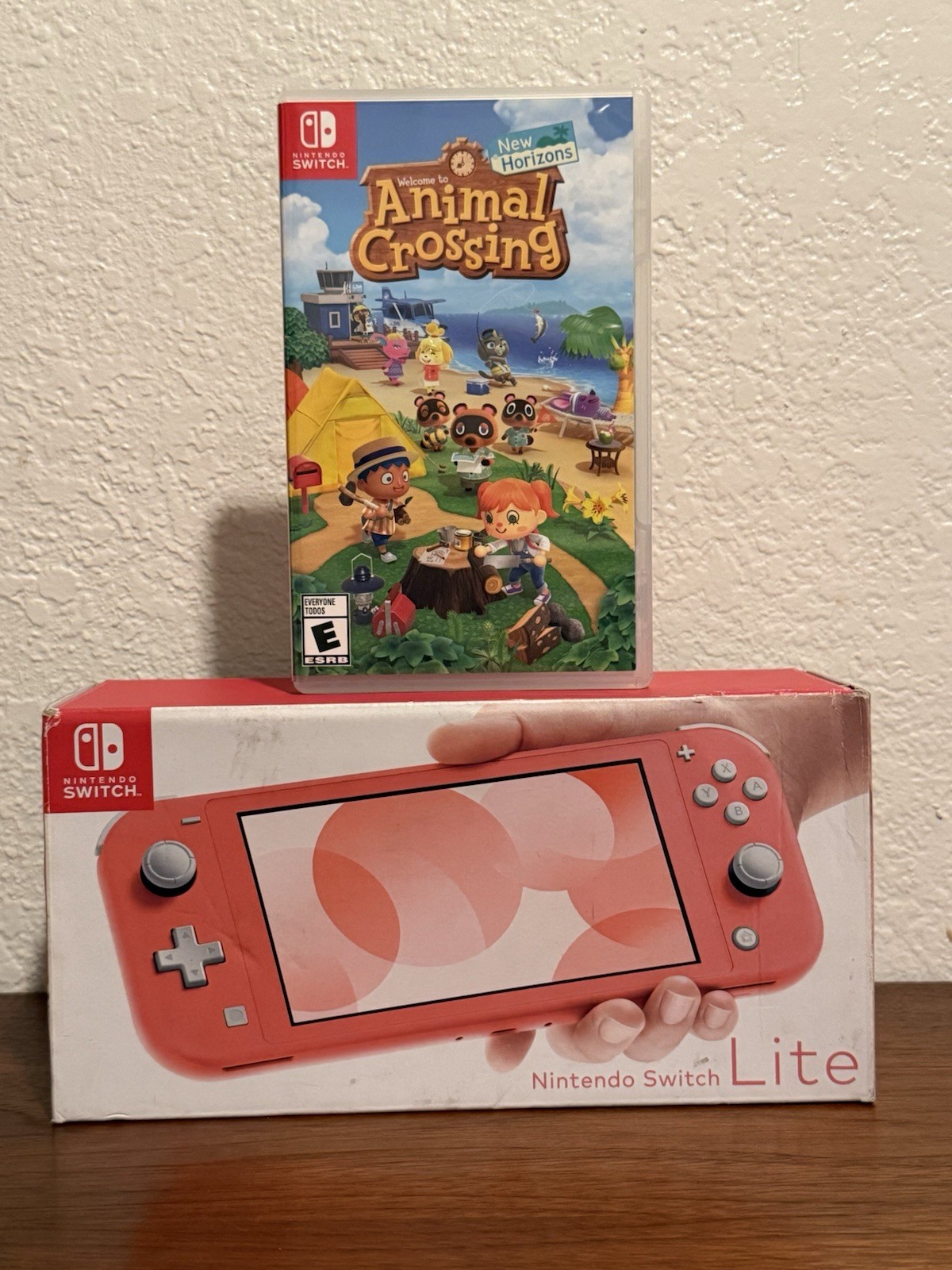 Nintendo Switch Lite 32 GB Gaming Console – Coral + Animal Crossing New Horizons