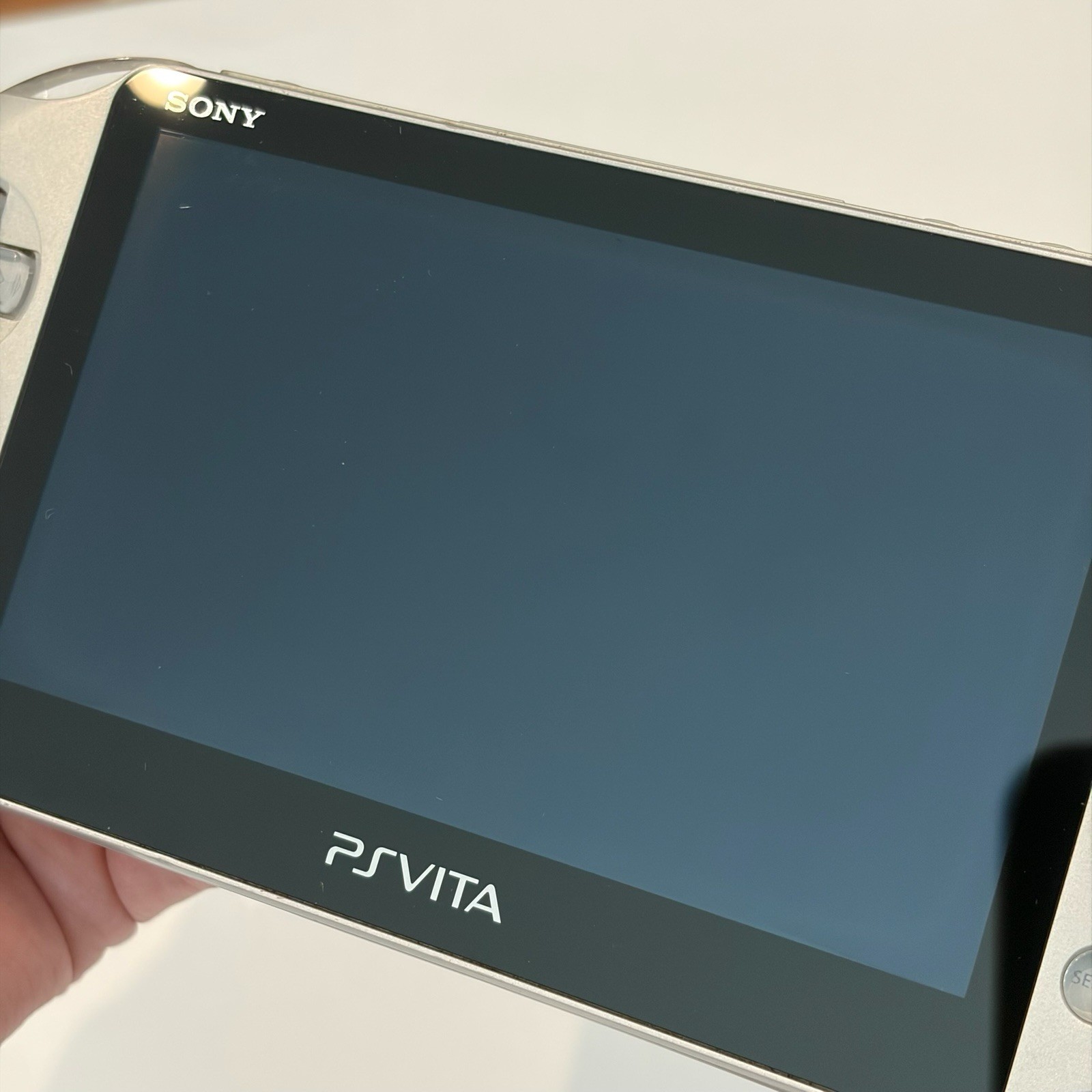 SONY PS Vita PCH-2000 Console Silver Very Good Fast Shipping No joystick drift.