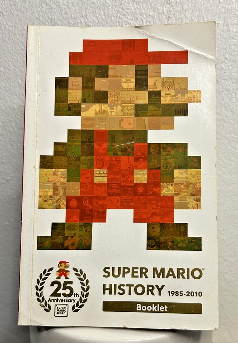 Super Mario History 1985-2010 25th Anniversary Booklet Pre Owned FAST SHIPPING