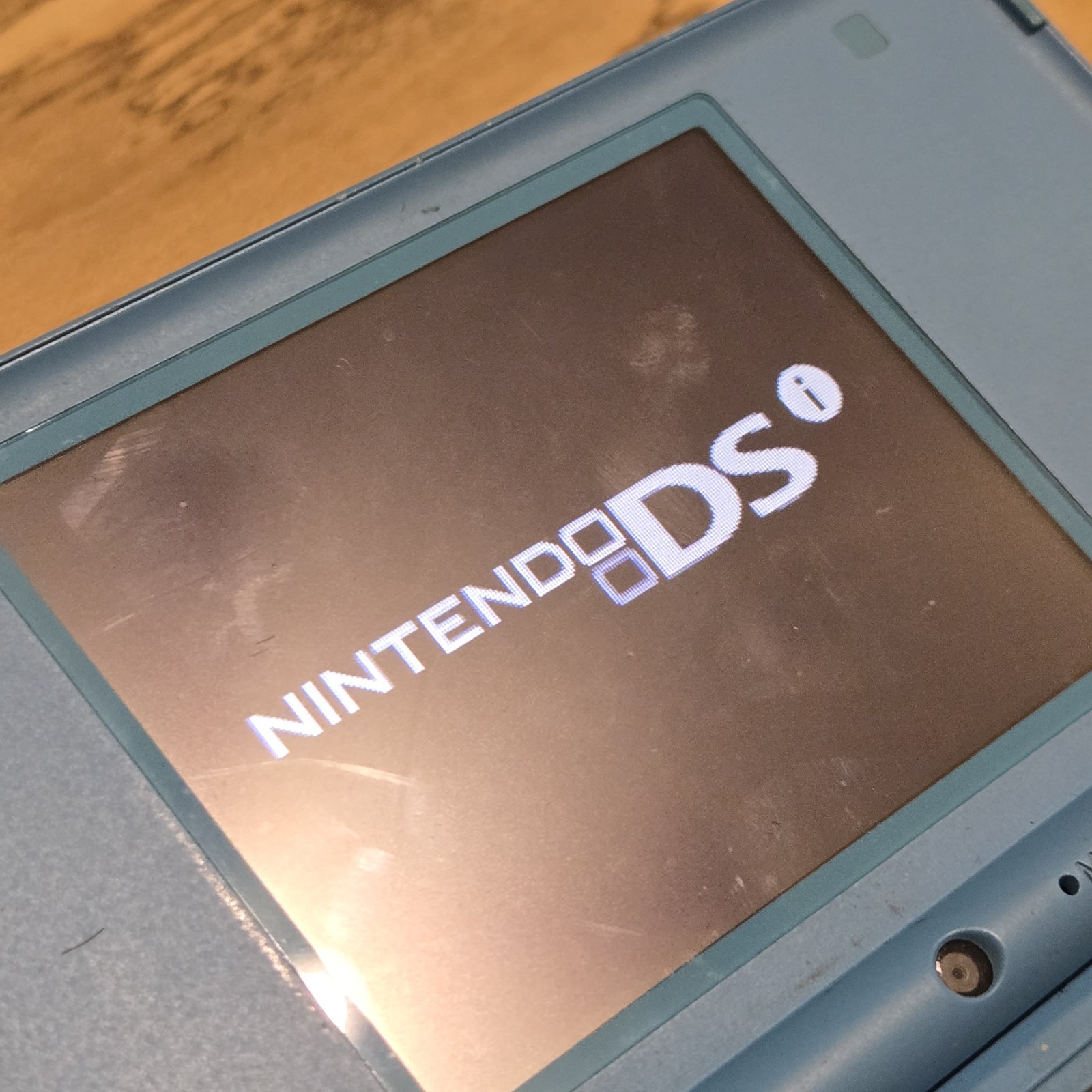 Nintendo DSi Light Blue System w/ Charger, Stylus, Case, Nerf Cover & SD Card