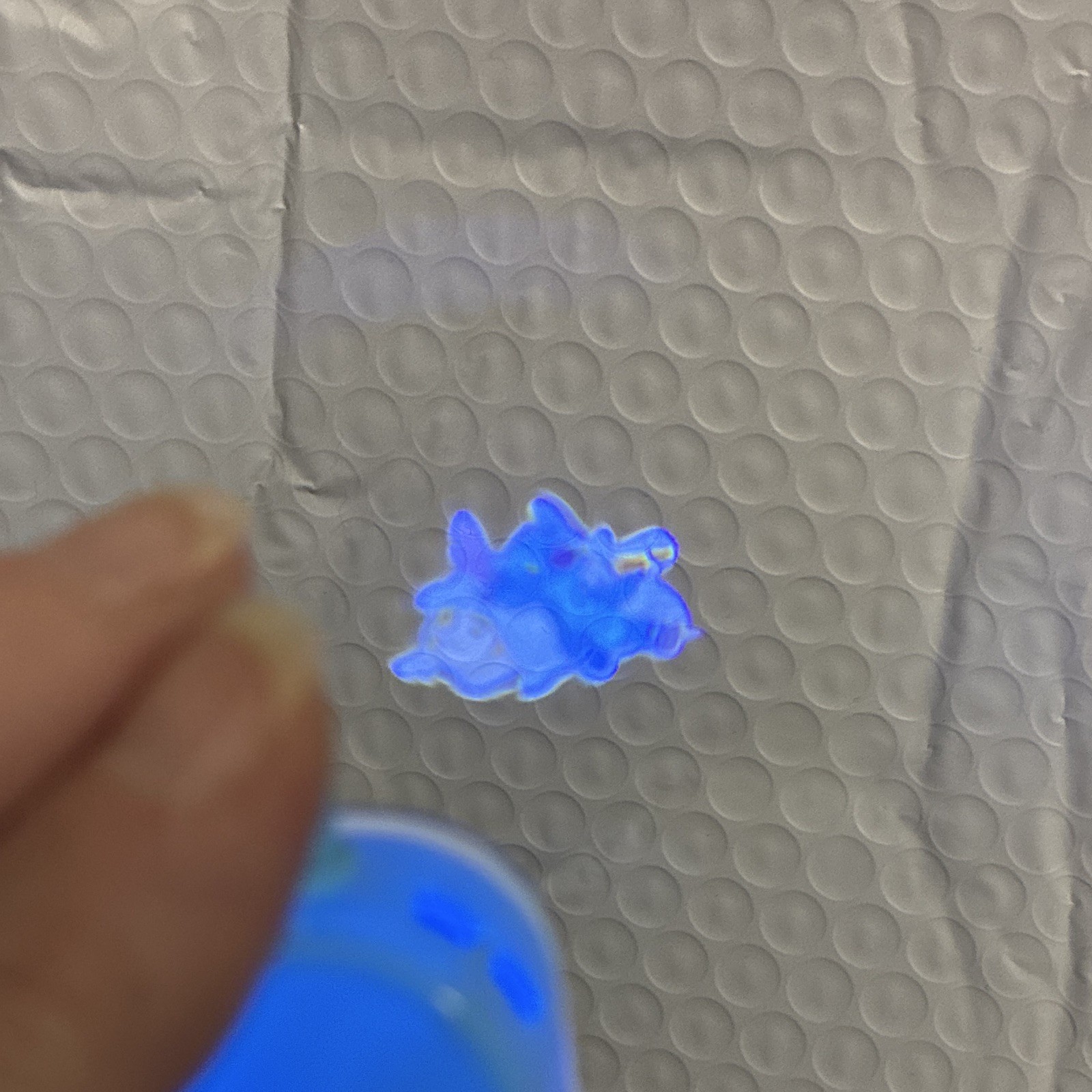 Disney Stitch Keychain – new one in bag/each click shows a new image on wall