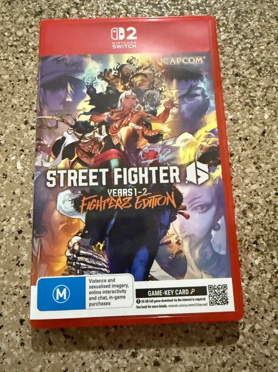 Street Fighter 6: Year 1-2 Fighters Edition (Switch 2) LIKE NEW WITH DLC CODE