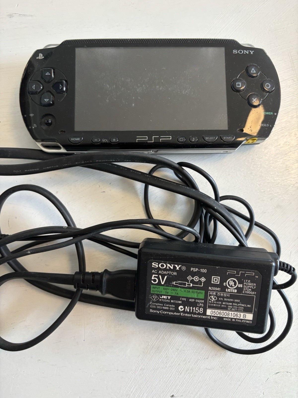 Sony PSP Console Only PSP-1001 Handheld For Parts Or Repair. Read- With Charger