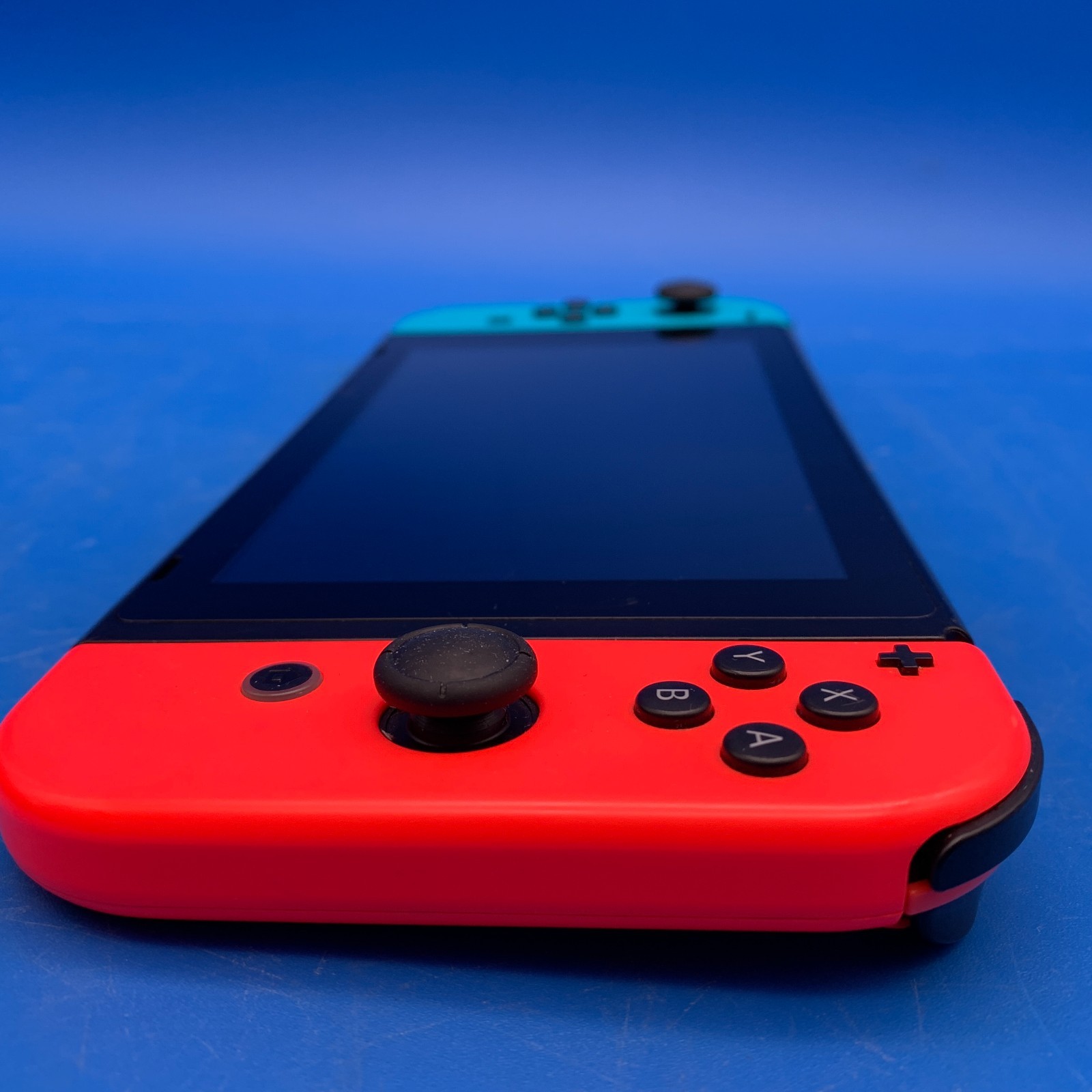 Nintendo Switch HAC-001(-01) 32GB Handheld Console w/ Red/Blue Joy-Cons + Case