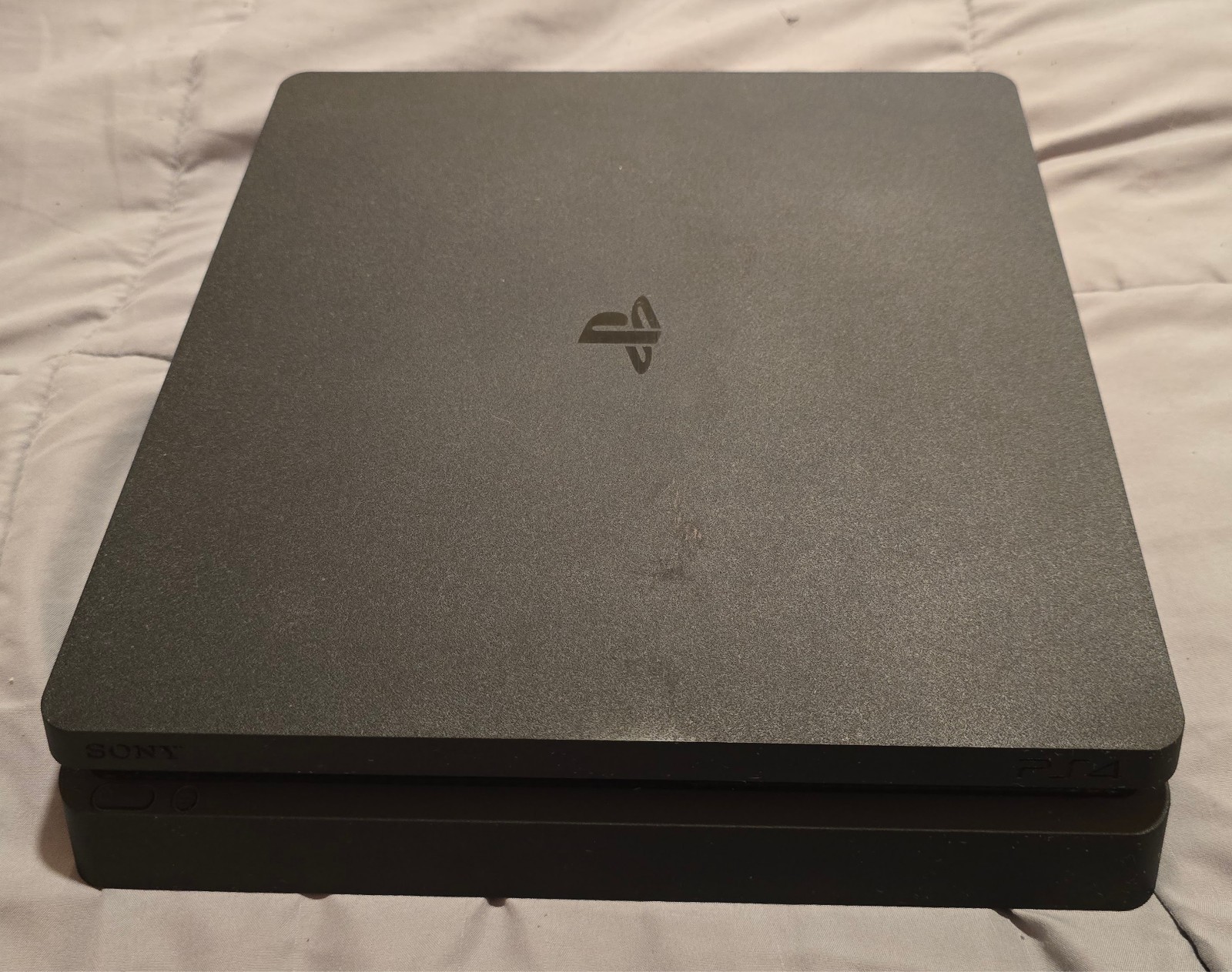 PS4 Slim 1TB Console Black + Controller & 7 Game Bundle – Call of Duty, Sports