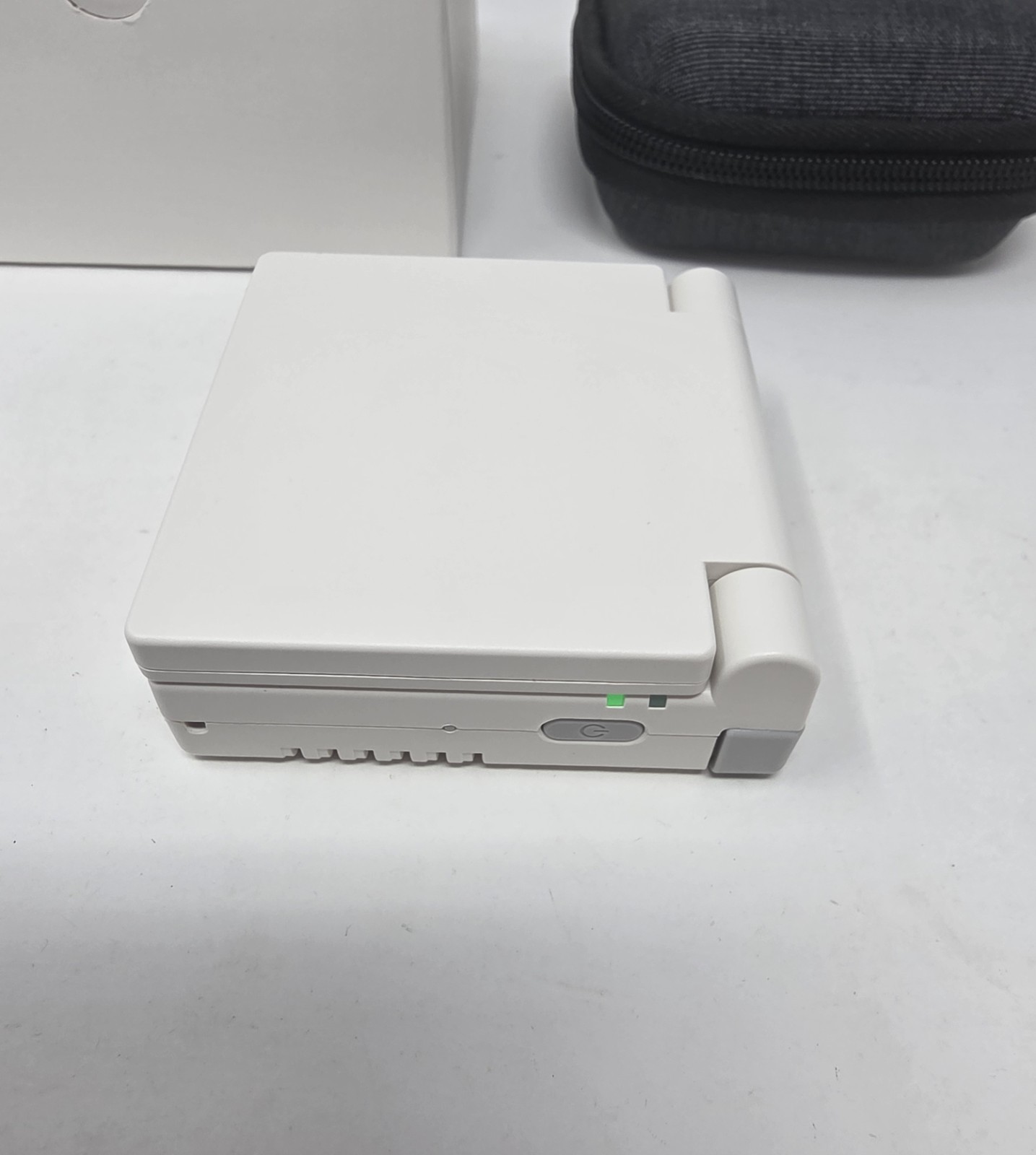 Anbernic RG 35XXSP – Clear White Linux Retro Handheld Game Console RG35XXSP 1GB