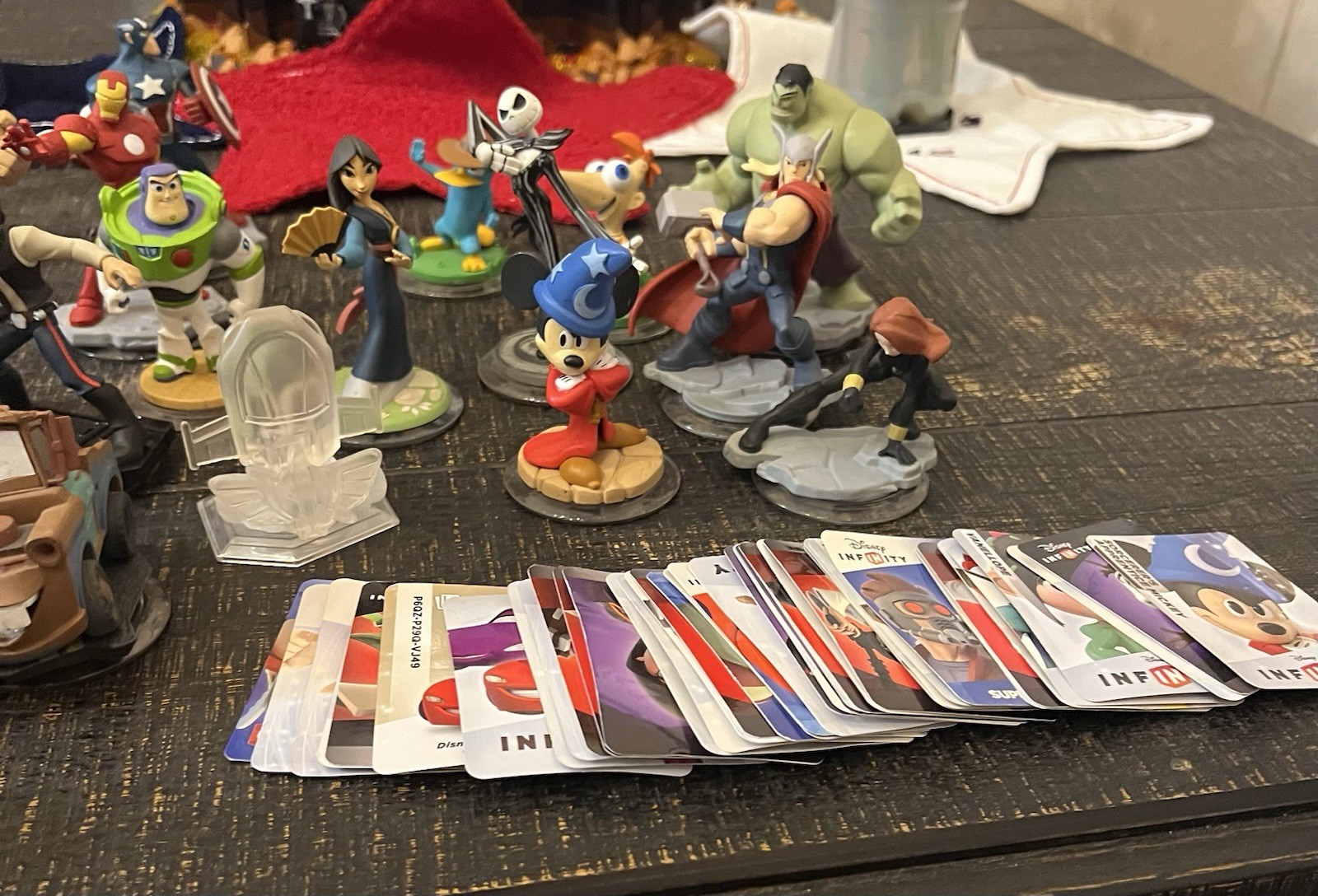 Assortment of Disney Infinity Figures With Power Disks And Play Cards (Not All)