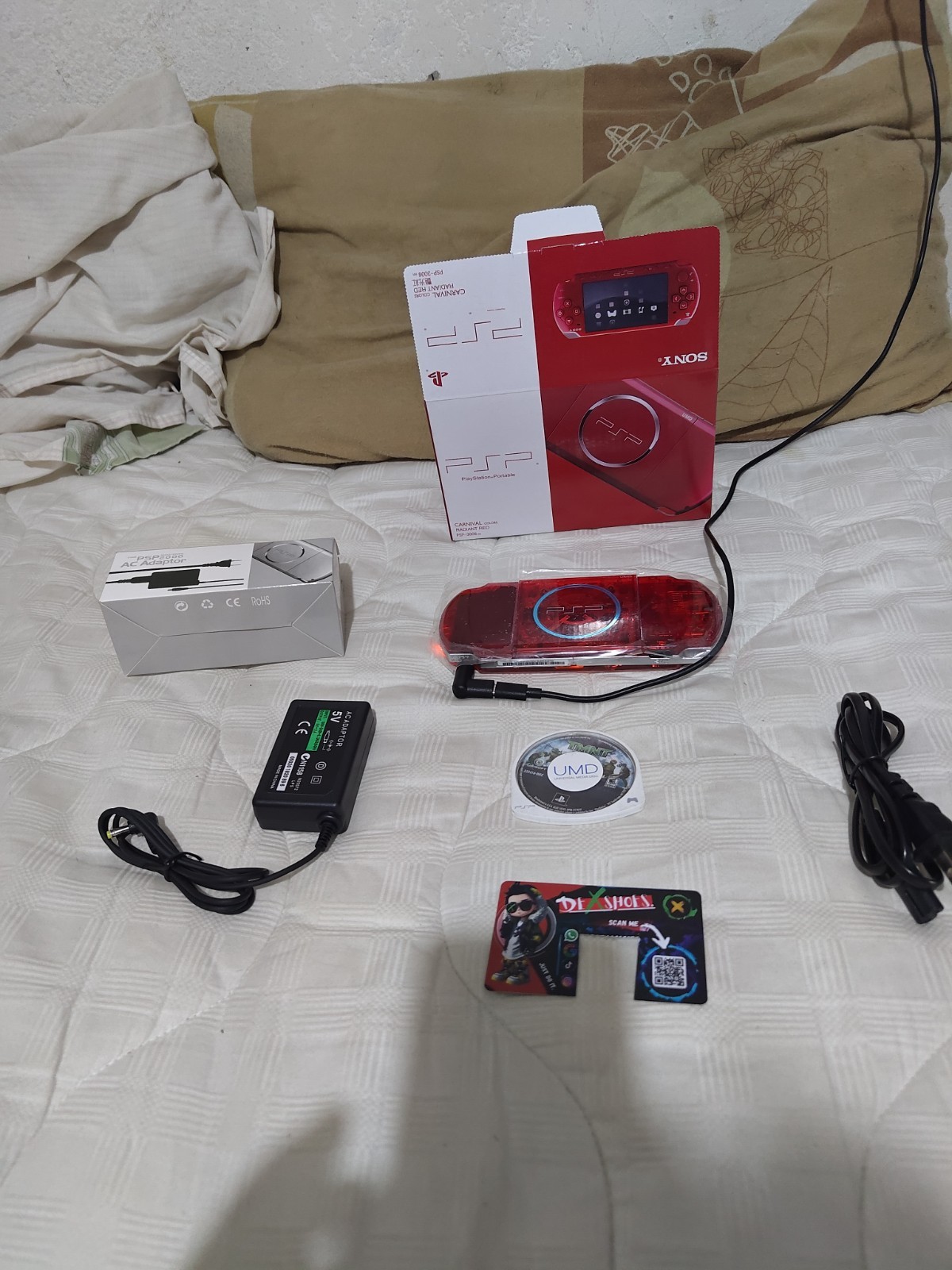 Sony PSP 3000 transparent red with 32 GB games USB-C adapter