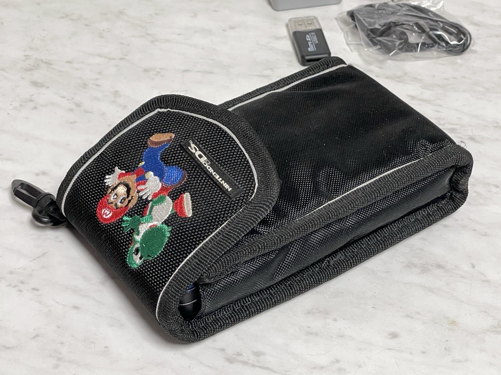 Nintendo DSi XL Console 8GB + OEM Charger & Mario/Yoshi Case (See Details)