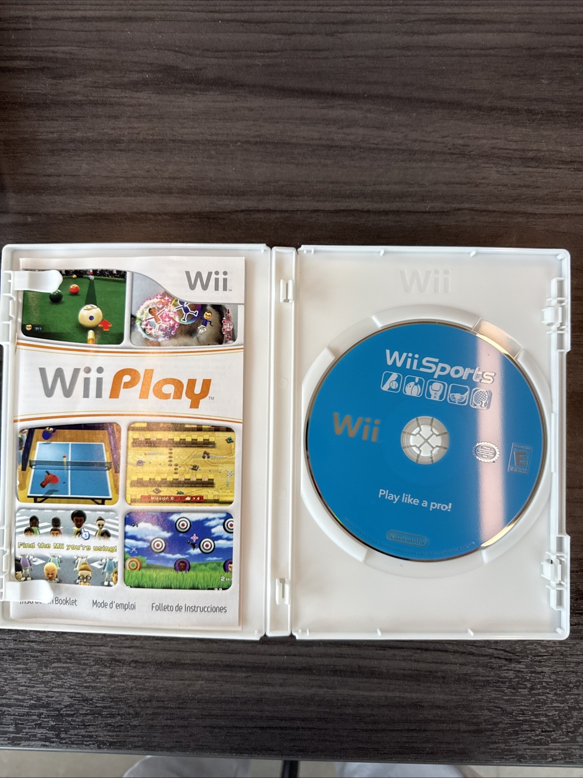 3 Popular Wii games In their Cases With Pamphlets.