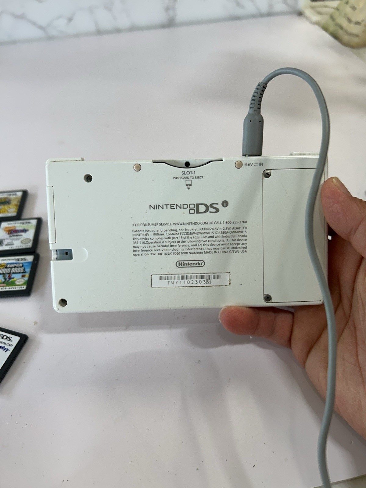 Nintendo DSi White With Print Cover Handheld System with 7 Games