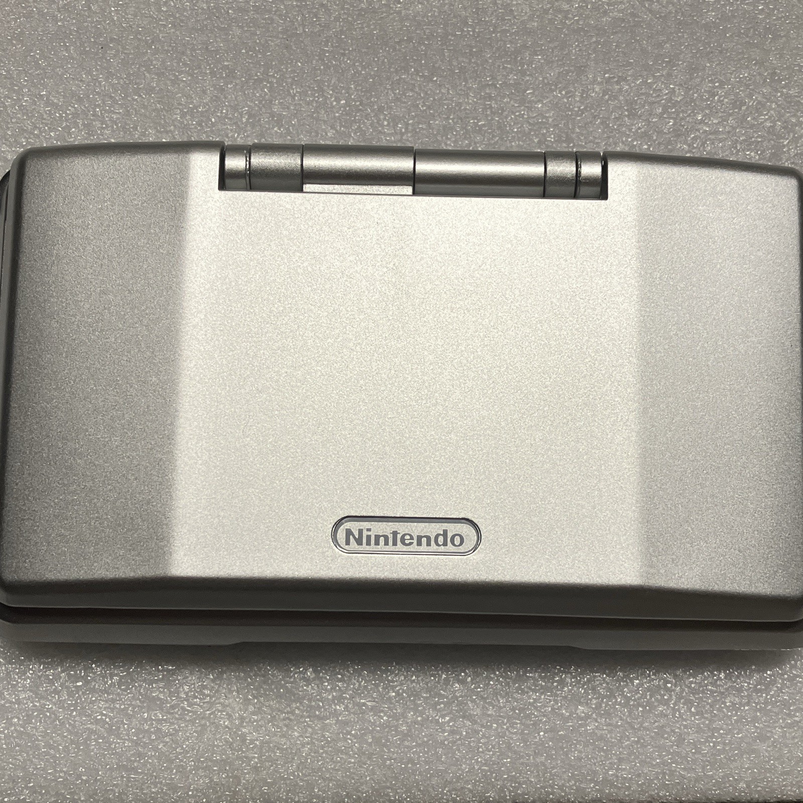 Nintendo DS Silver/Black Handheld Console as is no charger stylus or games