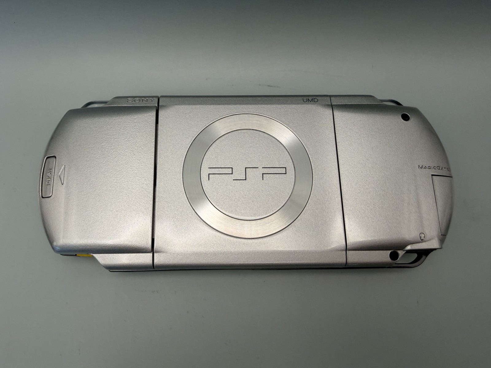 Sony PSP 1000 Silver Handheld Console – Tested Working + New Battery & Charger