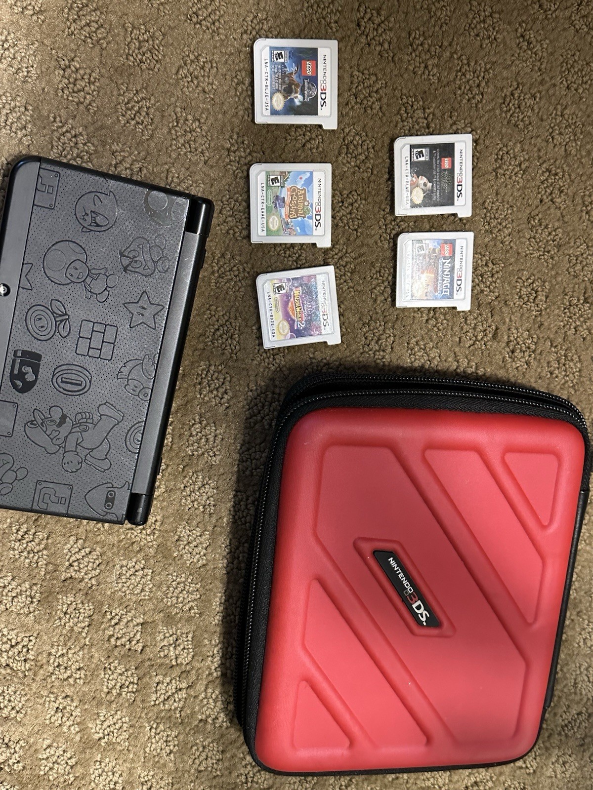 Nintendo 3DS Super Mario Black Edition with case and games