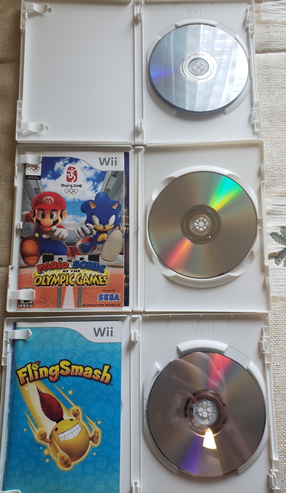 Wii Lot: Mario and Sonic at the Olympic Games, FlingSmash, and Super Monkeyball