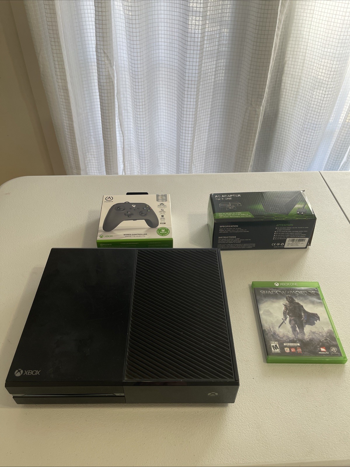 xbox one 500 GB bundle with brand new controller and game tested works great
