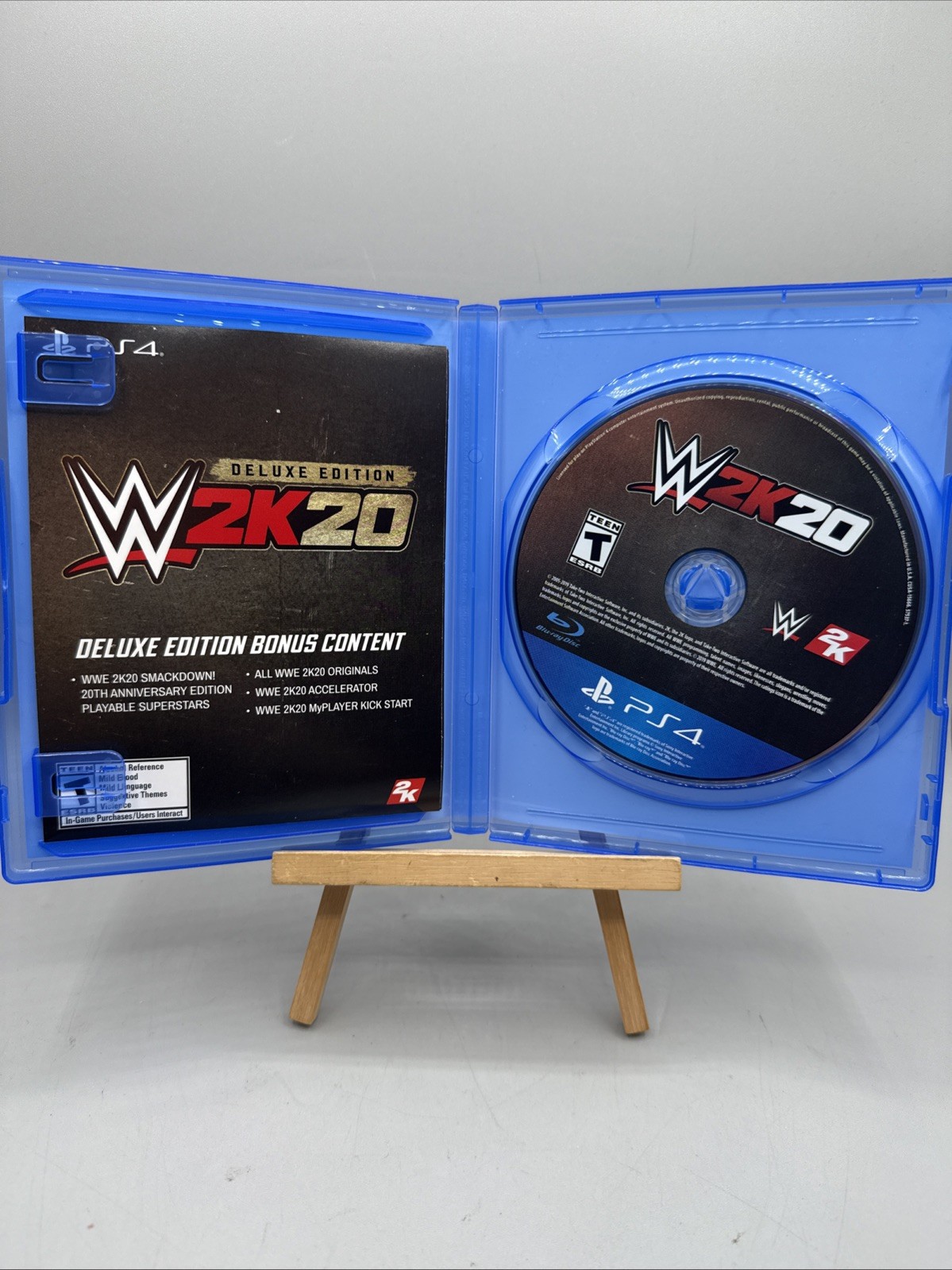 WWE 2K20 Deluxe Edition PS4 Playstation CIB Complete Code Expired. Tested works