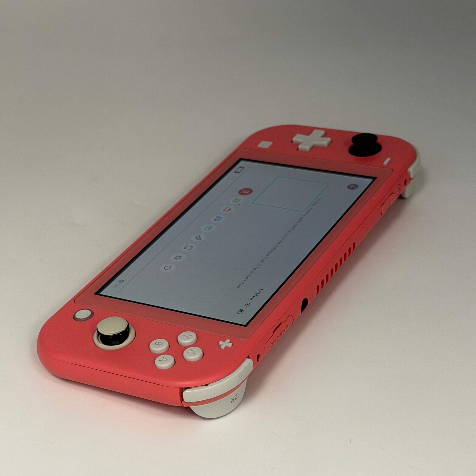 Nintendo Switch Lite Coral Handheld Video Game System Pink & Minecraft Game