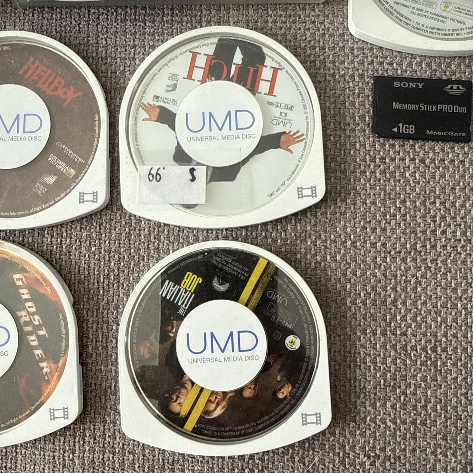 Sony PSP-1001 Black Console With Charger, 1GB Card , 11 Movies 2 Games & Case