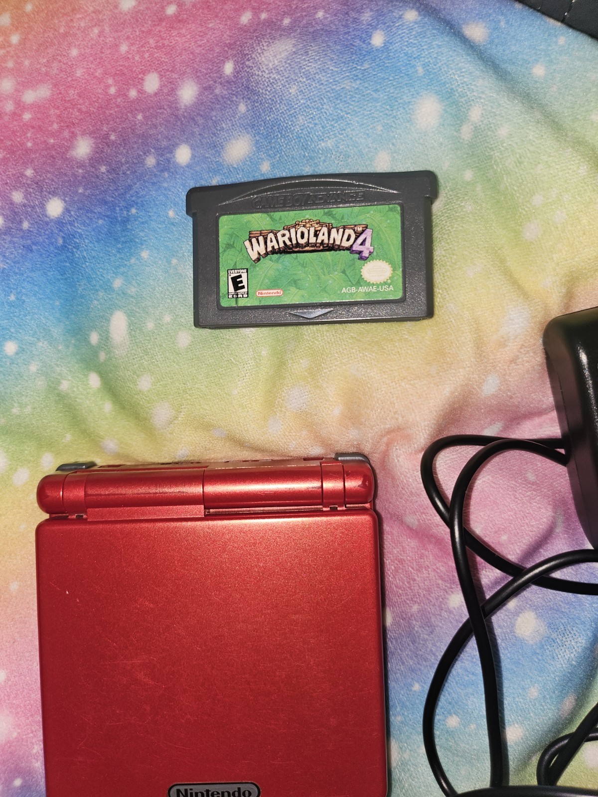Nintendo Game Boy Advance SP with Charger & 1 Game Warioland 4- Tested Flame Red