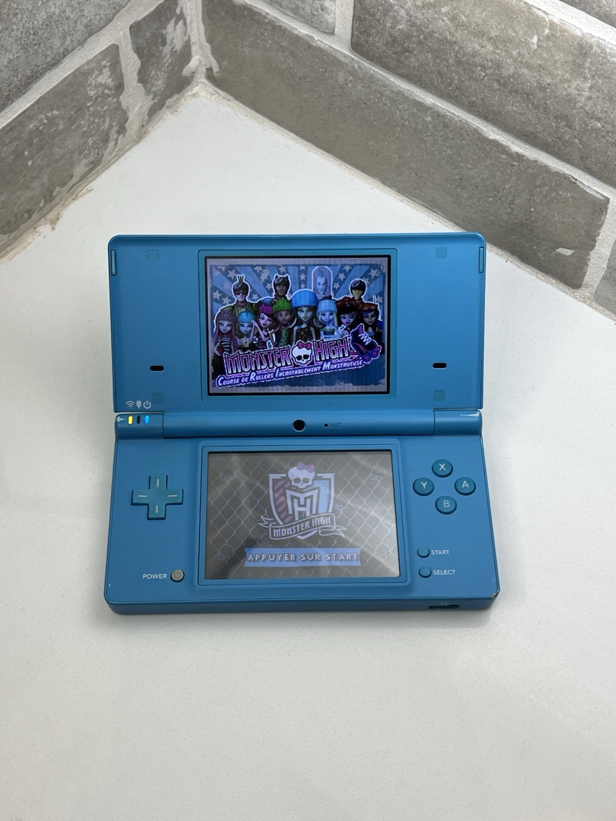 Nintendo DSi Light Blue Handheld Console Game System + Charger + Stylus Tested