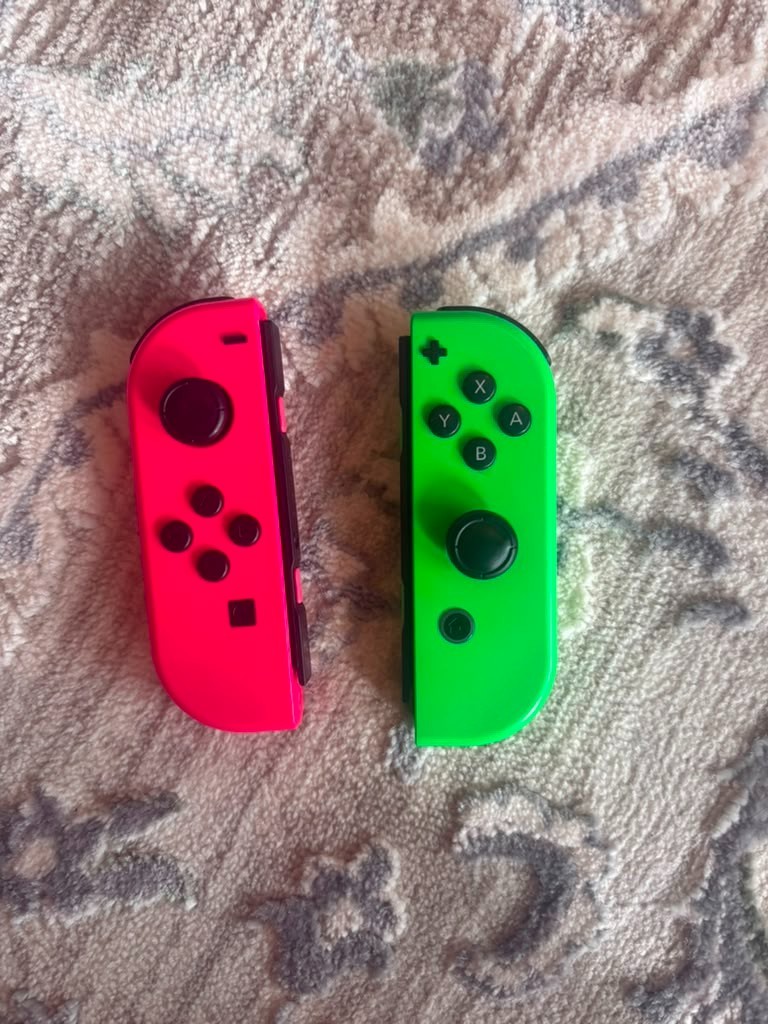 Nintendo Switch Handheld Console – Pink/Green joycons- Used