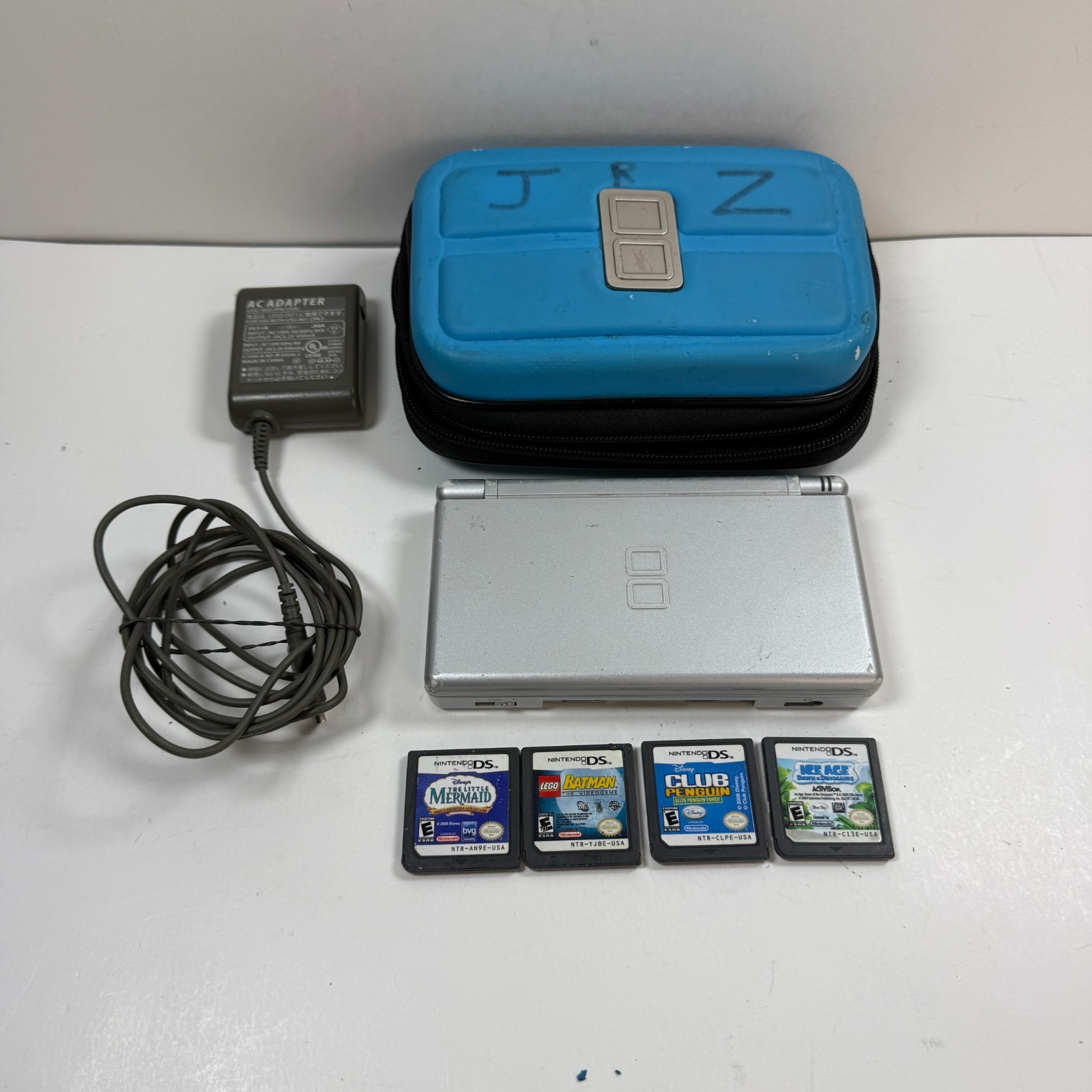 Nintendo DS Lite USG-001 Silver Handheld Console 4 Games + Charger