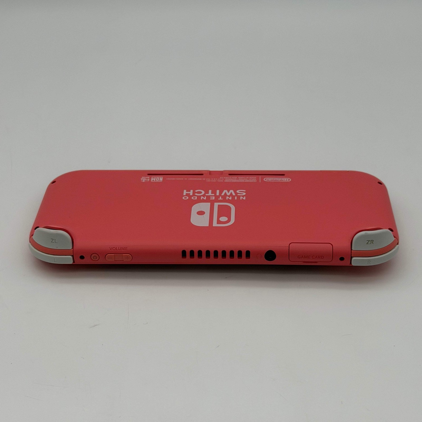 Nintendo Switch Lite Coral Handheld Video Game System Pink & Minecraft Game