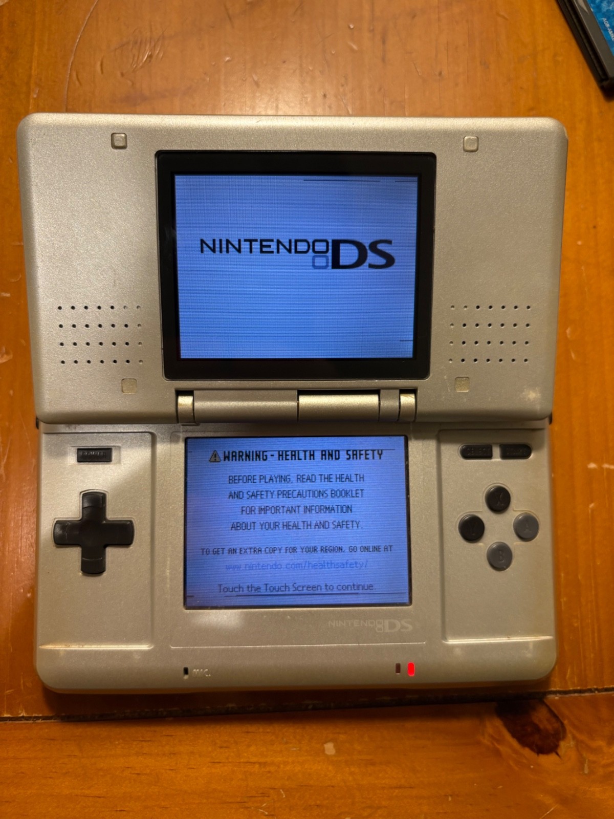 Nintendo DS Silver Handheld System – Fair Condition – TESTED AND WORKING (14D)