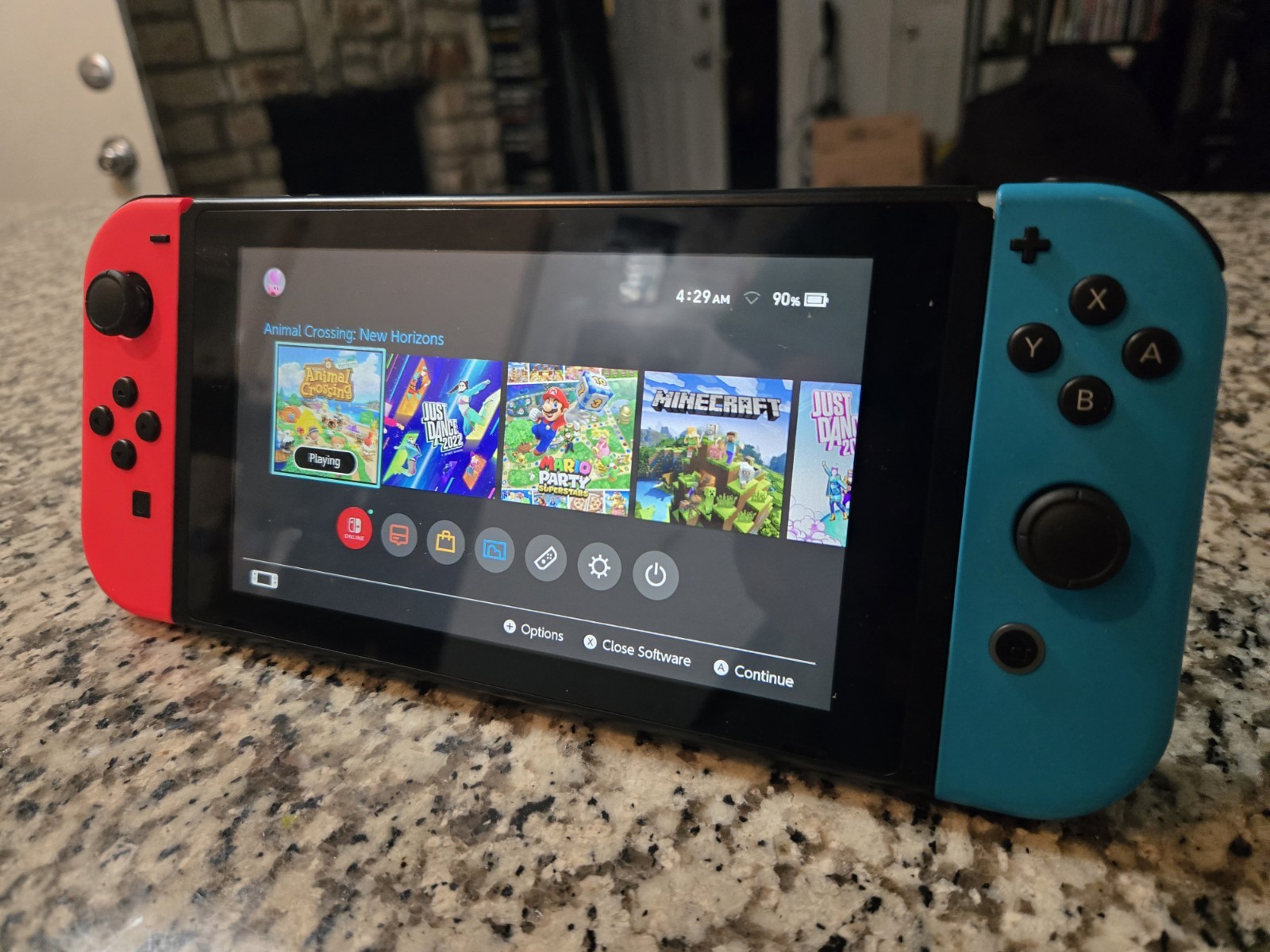 Nintendo Switch Console Handheld System w/ Neon Red & Blue Joy-Con, CLEAN