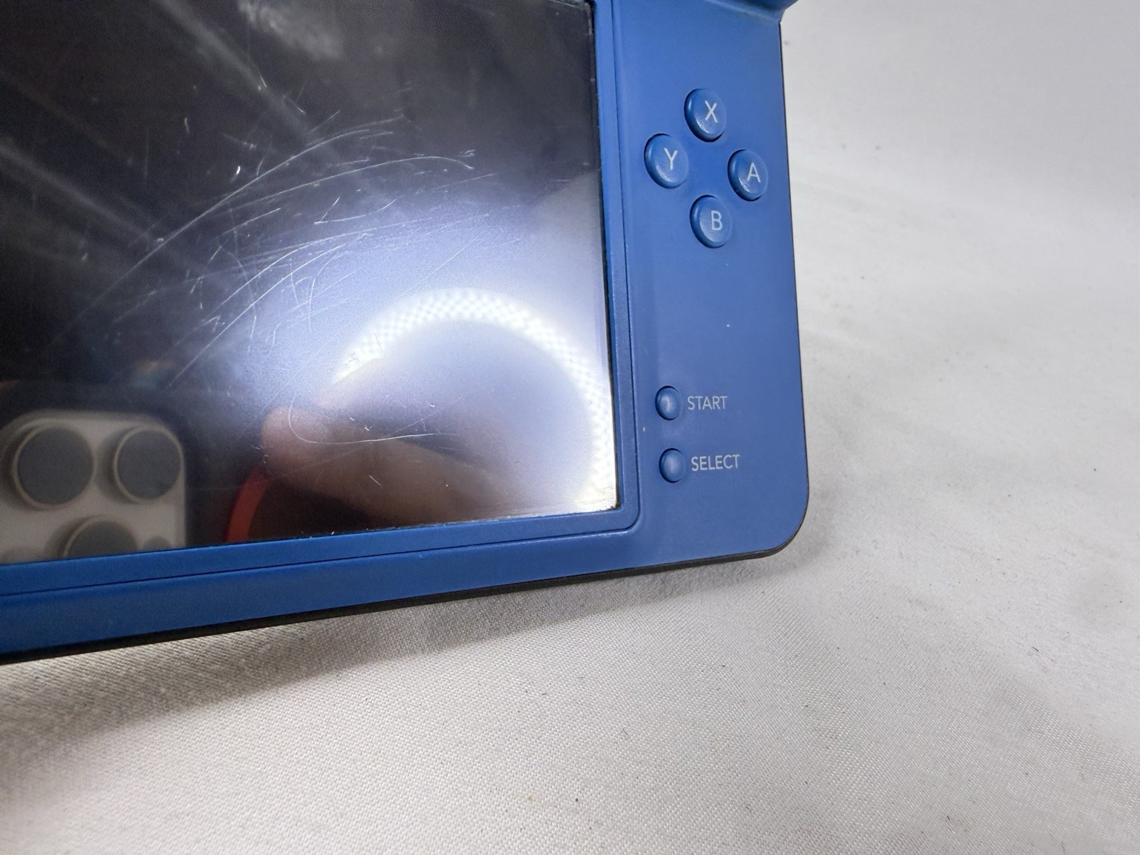 Nintendo DSi XL Handheld Game Console UTL-001 Midnight Blue, 5 Games & Charger