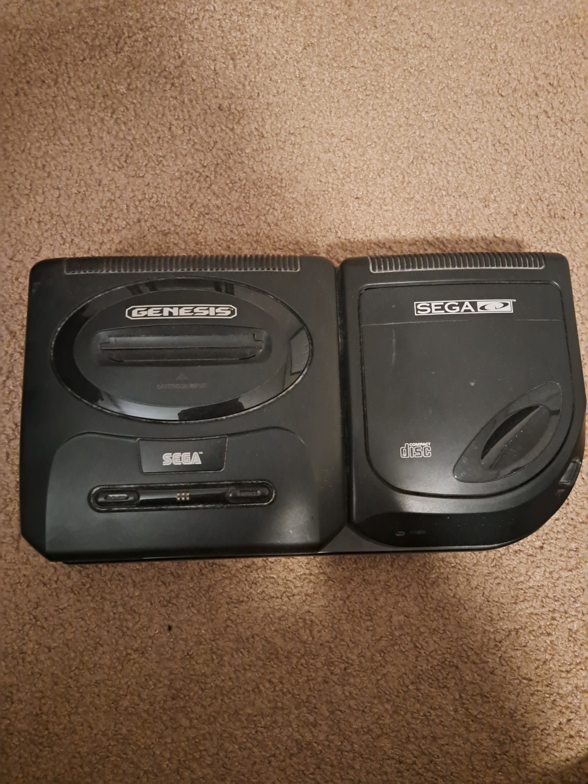 Sega Genesis CD Console. Comes with all of the cords, 2 controllers, and 3 games